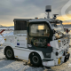 Remolque autónomo de equipajes en la nieve en el aeropuerto Gardermoen de Oslo